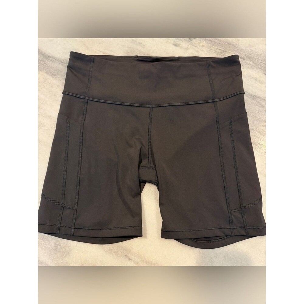 Athleta Women’s L Ultimate Stash II 7 Inch Short Black Side Pockets Compression